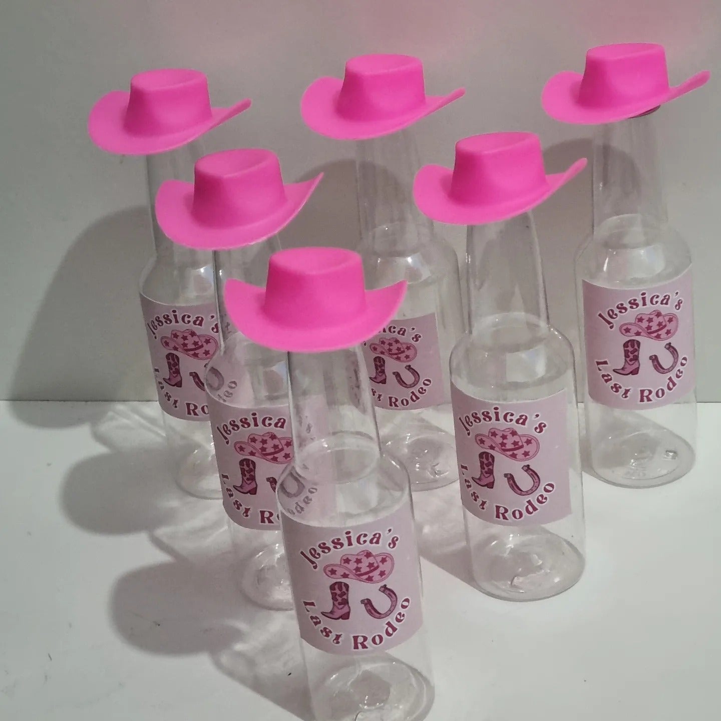 empty bottles with personalised stickers